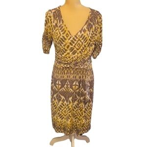 Tahari faux wrap jersey dress. Aztec print. Gray, white and yellow. Size 10.